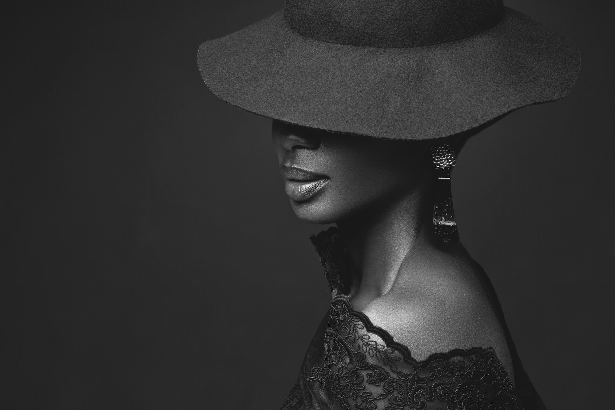 Beautiful girl in black hat