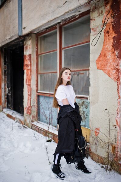 Fashionable brunette model at winter day